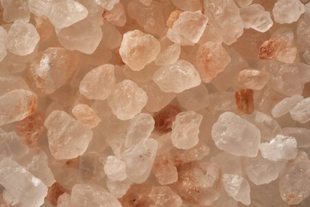 A close up of pink salt crystals.