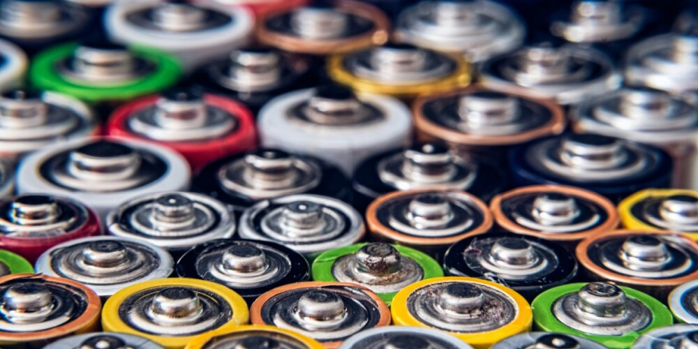 A close up to the top of batteries.