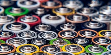 A close up to the top of batteries.